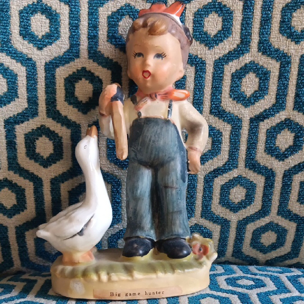 Charming Figurine with Boy and Goose
